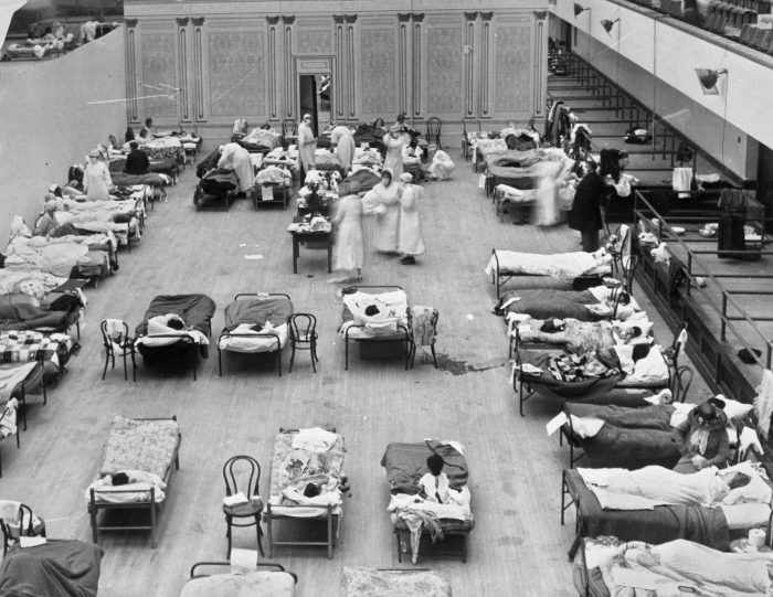 Another pandemic 102 years ago: Volunteer nurses from the American Red Cross tend to influenza patients in the Oakland Municipal Auditorium Another pandemic 102 years ago: Volunteer nurses from the American Red Cross tend to influenza patients in the Oakland Municipal Auditorium