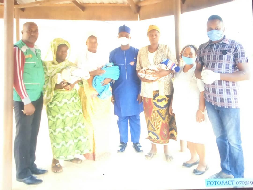 The triplets, mother, the PHC Coordinator Dr. Barnabas Aliu and other Senior medical staff at Ikaram health centre