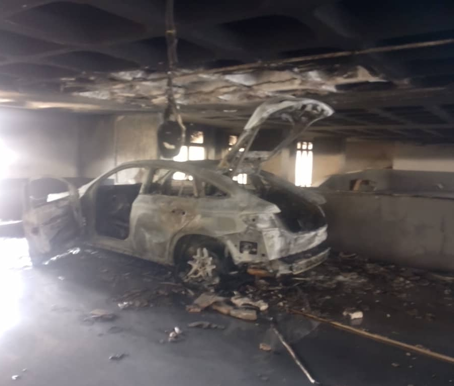 Fire razes car at polaris bank tower on Lagos Island, no casualties